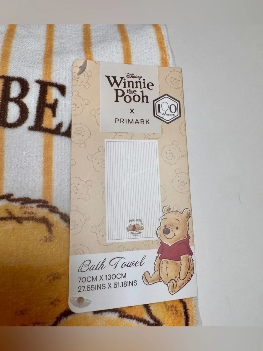 NWT Primark Disney Winnie the Pooh graphic bath towel. Yellow & white striped